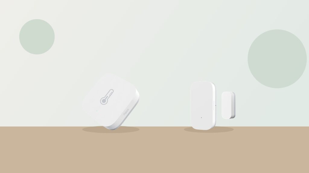 Aqara temperature and humidity sensor beside an Aqara T1 door and window sensor